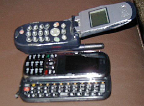 old phone, new phone, they both can be used for talking Motorola i60c (old) next to LG Rumor2 (new)