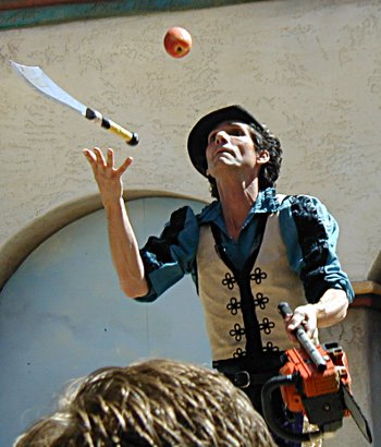 this is much harder than it looks Dextre Tripp juggling a knife, apple, and chainsaw