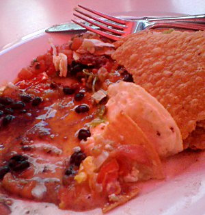 more food than anyone needs large plate of huevos rancheros