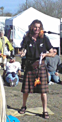 it's all in perfect workin' order, lassie juggler wearing a kilt