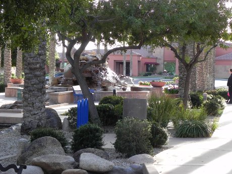 grass, trees, and water at Sun City Grand