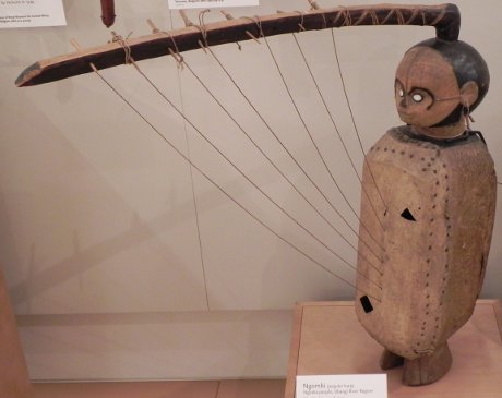 African harp that sort of looks like a person and is a little bit creepy